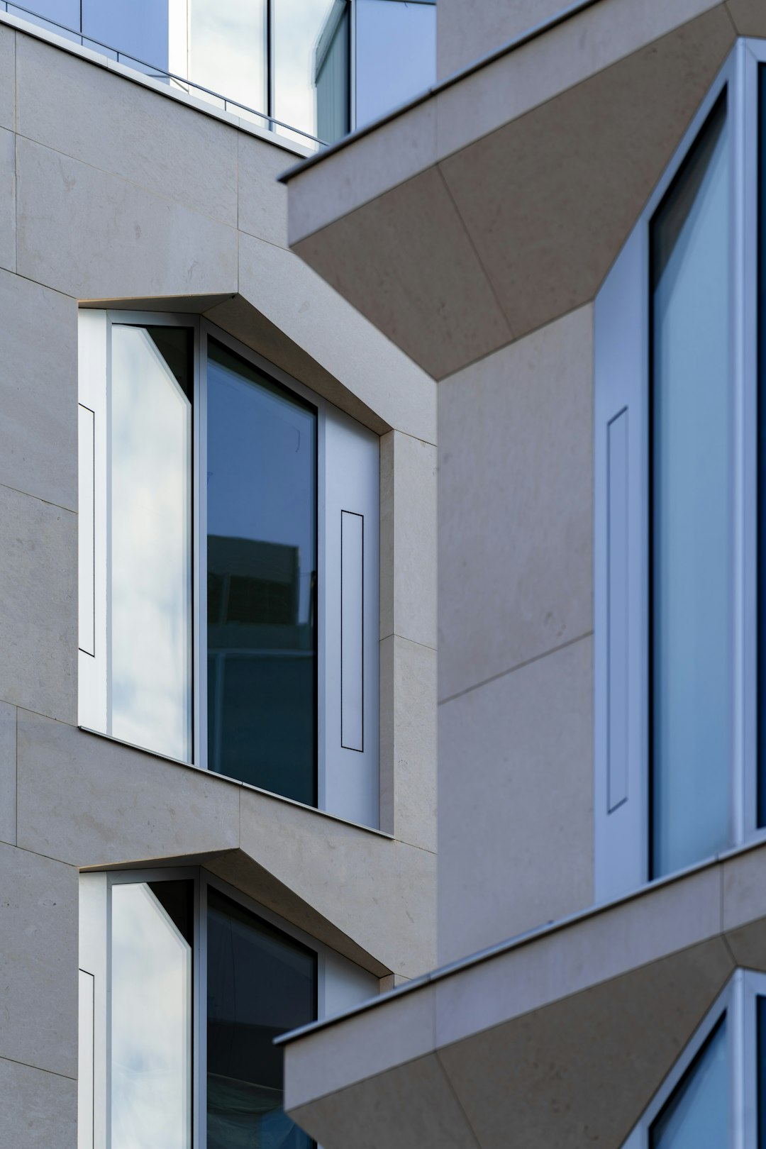 modern-building-facade-with-geometric-windows-frqu-pkbiu4